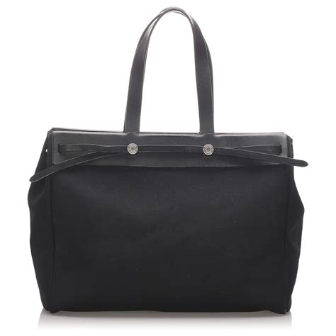 hermes toile herbag cabas noir black retail|The Complete Guide to the Hermès Herbag .